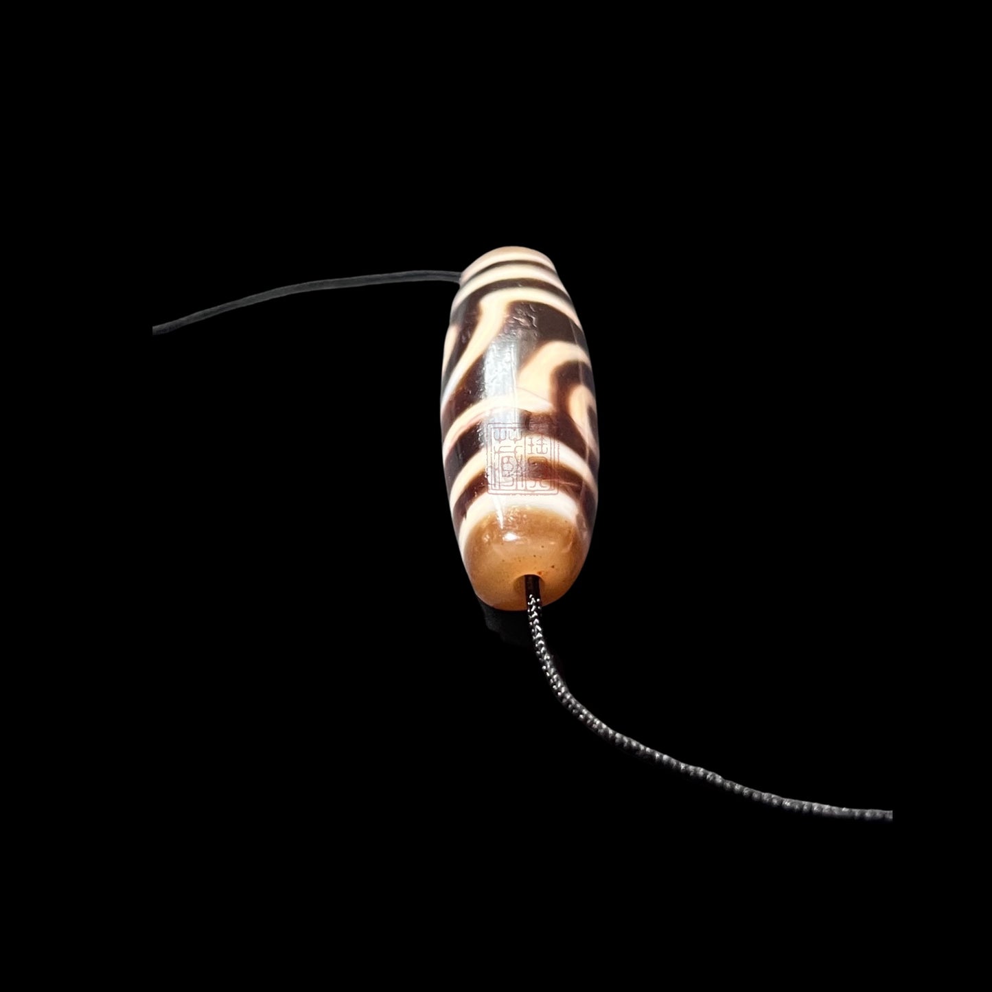 Double Line Ruyi Two-Eyed Dzi 雙線如意兩眼天珠