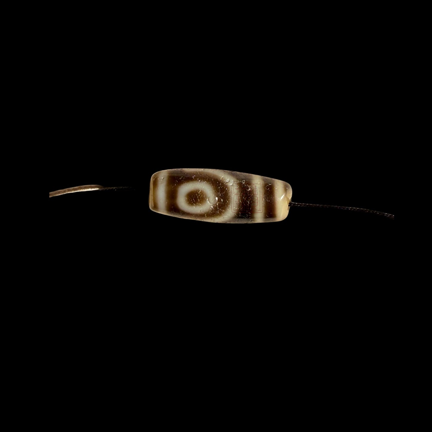 Ruyi Two-Eyed Dzi 如意兩眼天珠